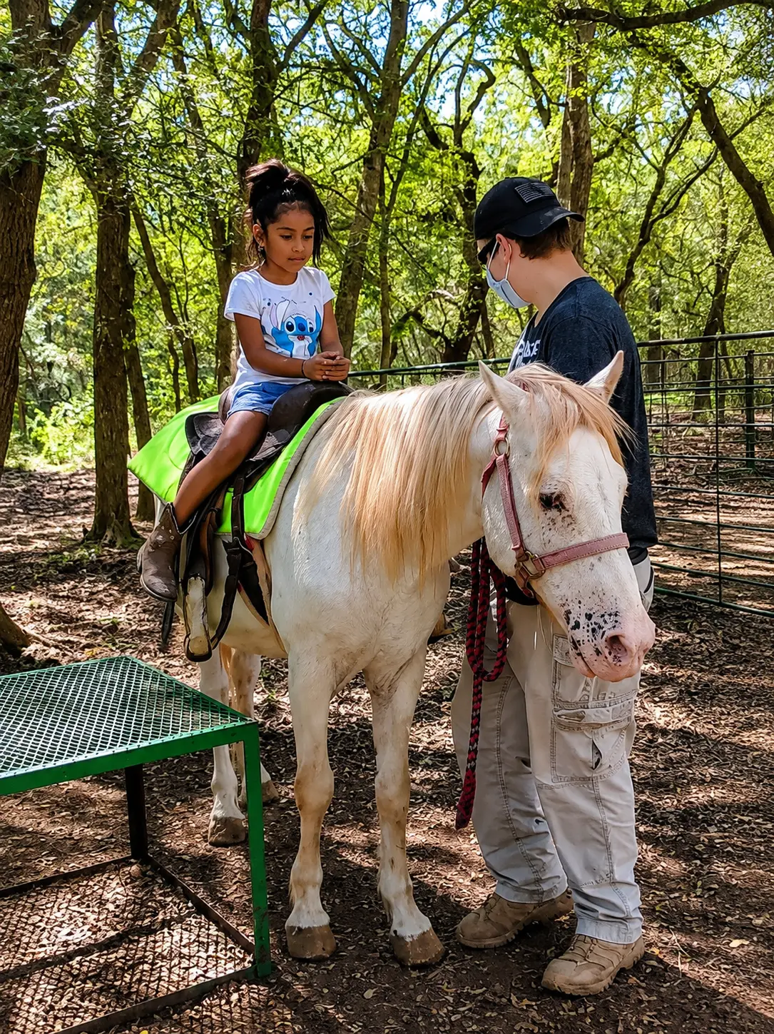 Pony rides through the shady trails